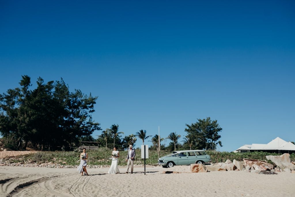 Broome wedding bride arrive in Holden on Cable Beach with her father