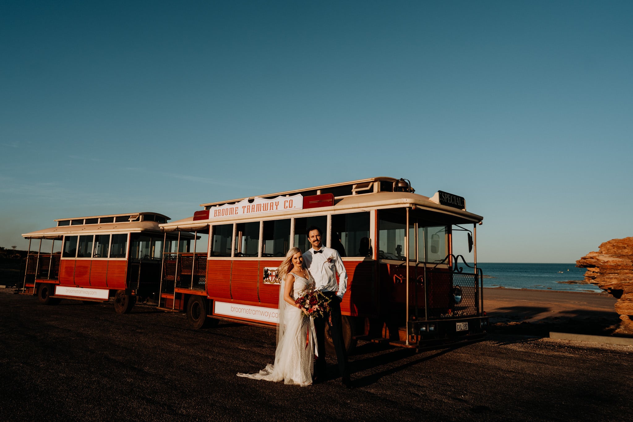 broome entrance point wedding couple in front of broome tram