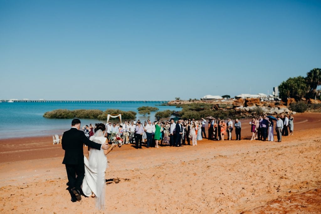 father and daughter at beach wedding at the shores of Roebuck Bay in Broome