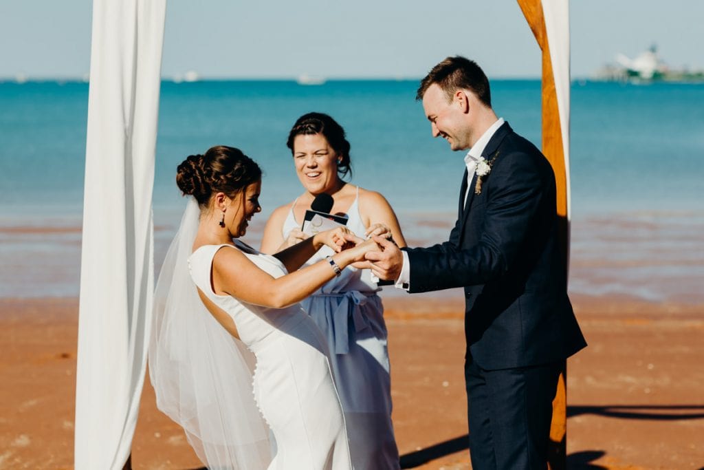 wedding couple exchanging rings at Broome wedding 