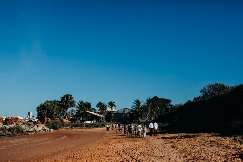 people walking towards the Broome Hovercraft Base at Roebuck Bay