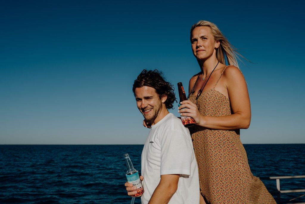 young Australian couple on board of cruise boat in Broome