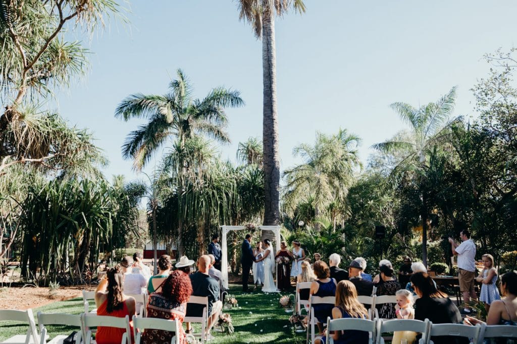 wedding ceremony at Lily Pond Gardens at Cable Beach Club