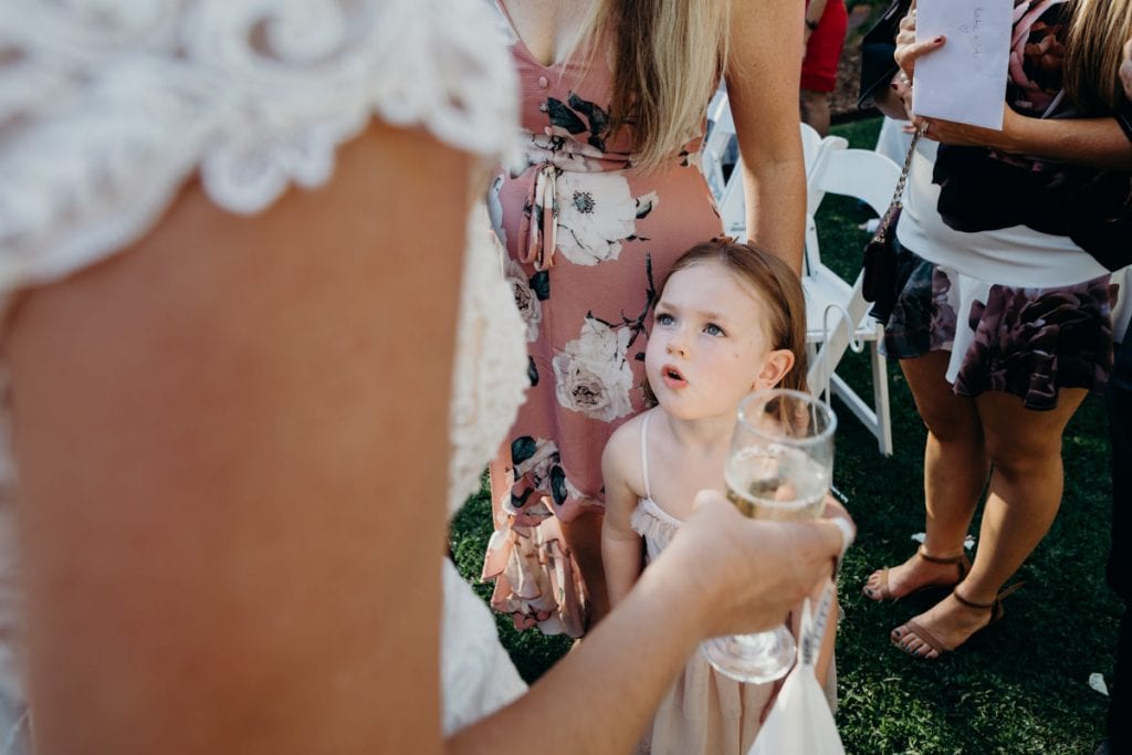 little girls looks at bride