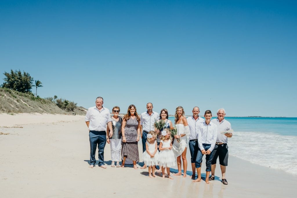 family photo on Cable Beach with bride and groom