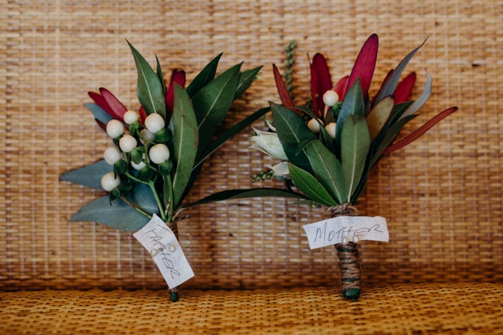flower buttonholes for father and mother