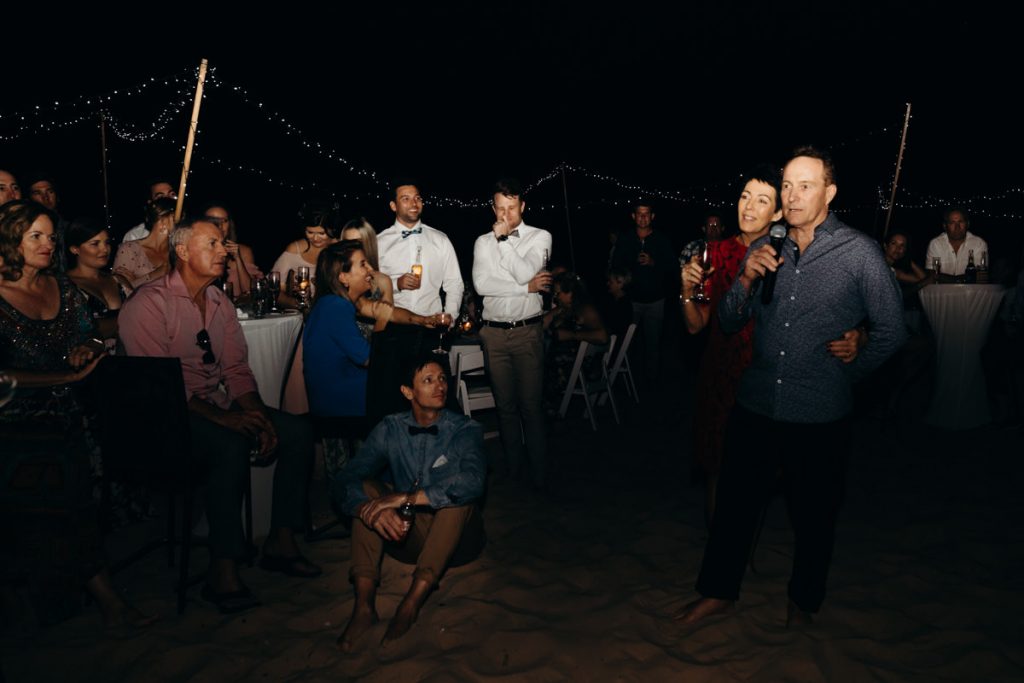 Father of the bride giving a speech on the beach
