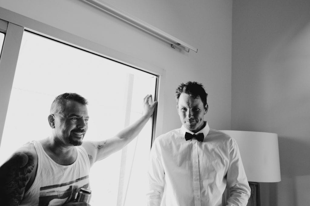 groom and his brother are getting ready for Eco Beach wedding
