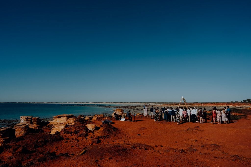wide view of wedding at Gantheaume Point with Indian ocean in the background